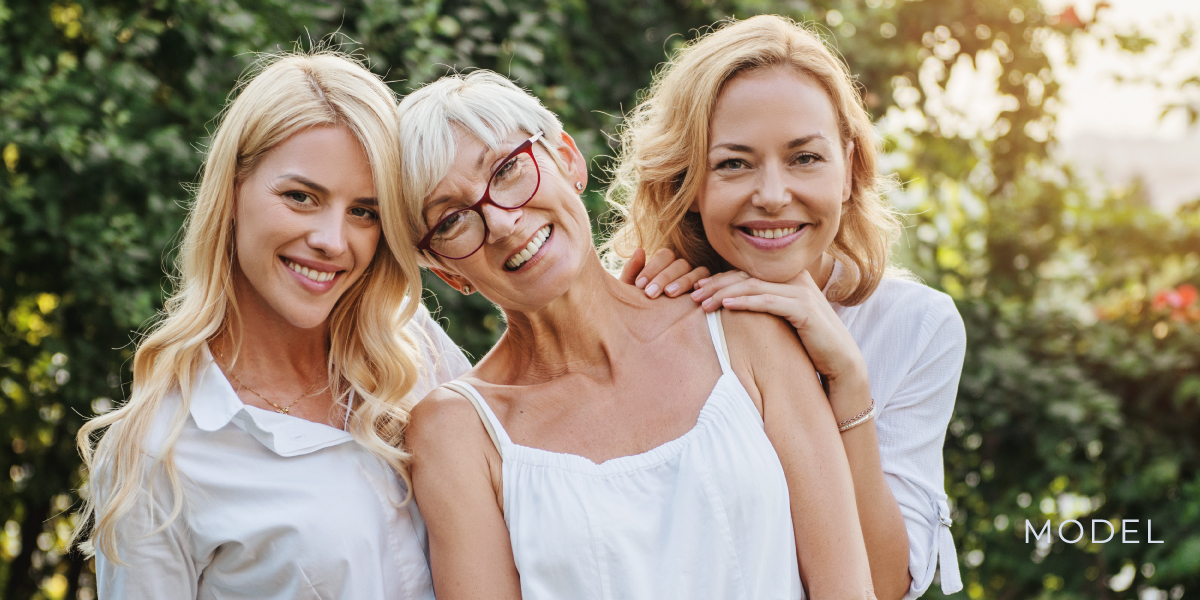 Models portraying three generations of a family chattanooga periodontics dental implants